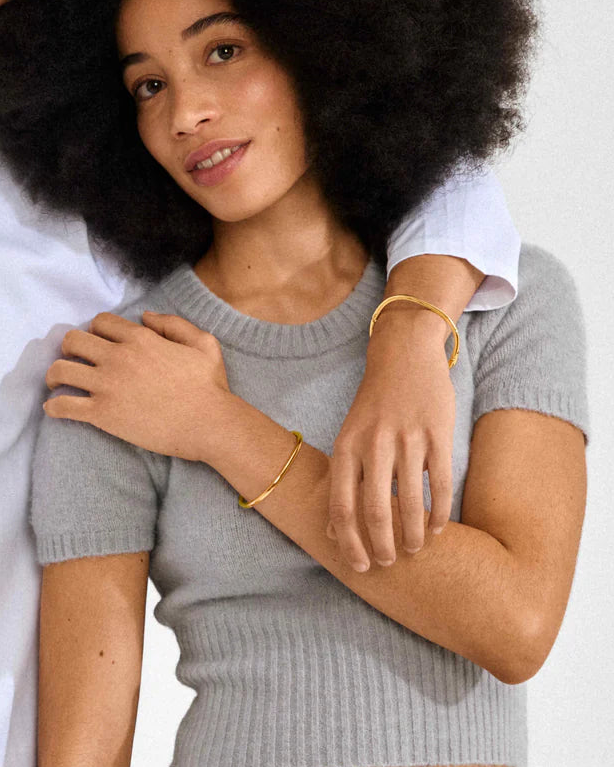 ALAIA Bangle in Gold | Pilgrim