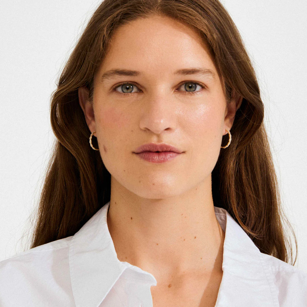 Ezo Medium Twirled Crystal Hoops in Gold | Pilgrim