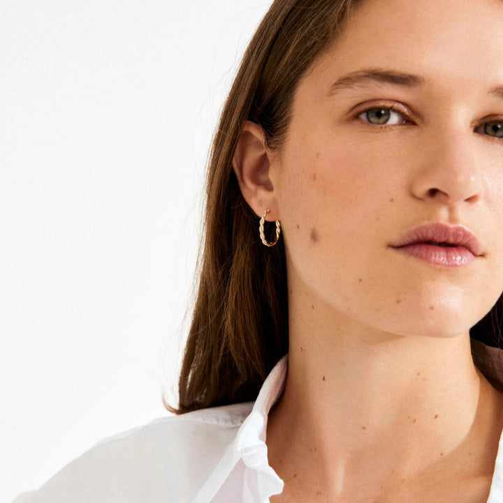 Ezo Medium Twirled Crystal Hoops in Gold | Pilgrim