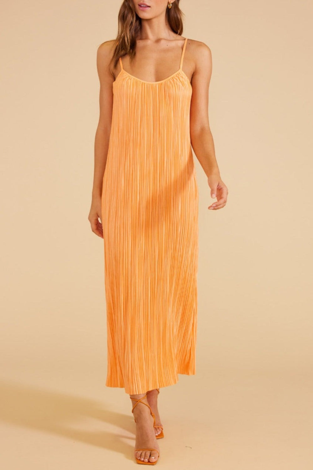 livia plisse midi dress in orange by minkpink. Summer23. Jolie folie boutique