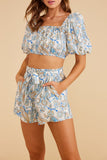 Marianne paperbag paisley shorts by minkpink. With pockers and a belt. Summer23. Jolie folie boutique